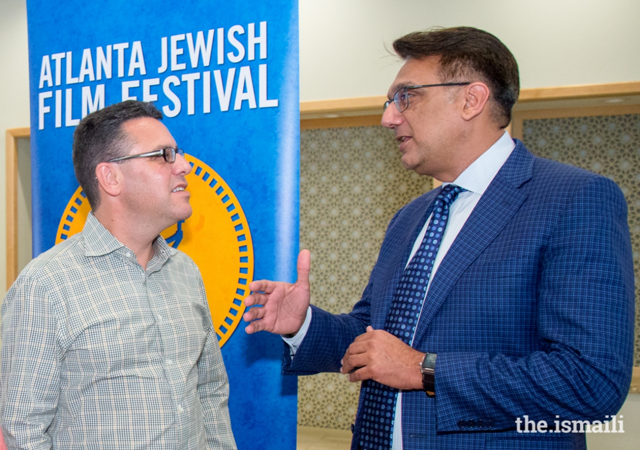 Southeast Ismaili Council President Murad Abdullah and Exec. Director of Atlanta Jewish Film Festival, Kenny Blank, in conversation at the Ismaili Jamatkhana in Norcross, Georgia.