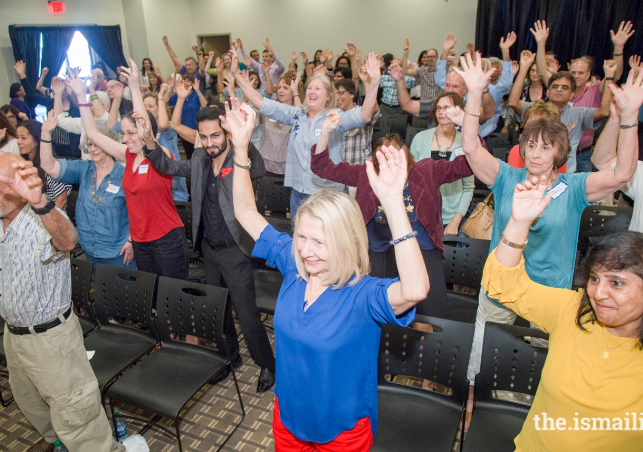 Attendees enjoy an impromptu Bollywood dance lesson, led by members of the DanceFlix Academy.