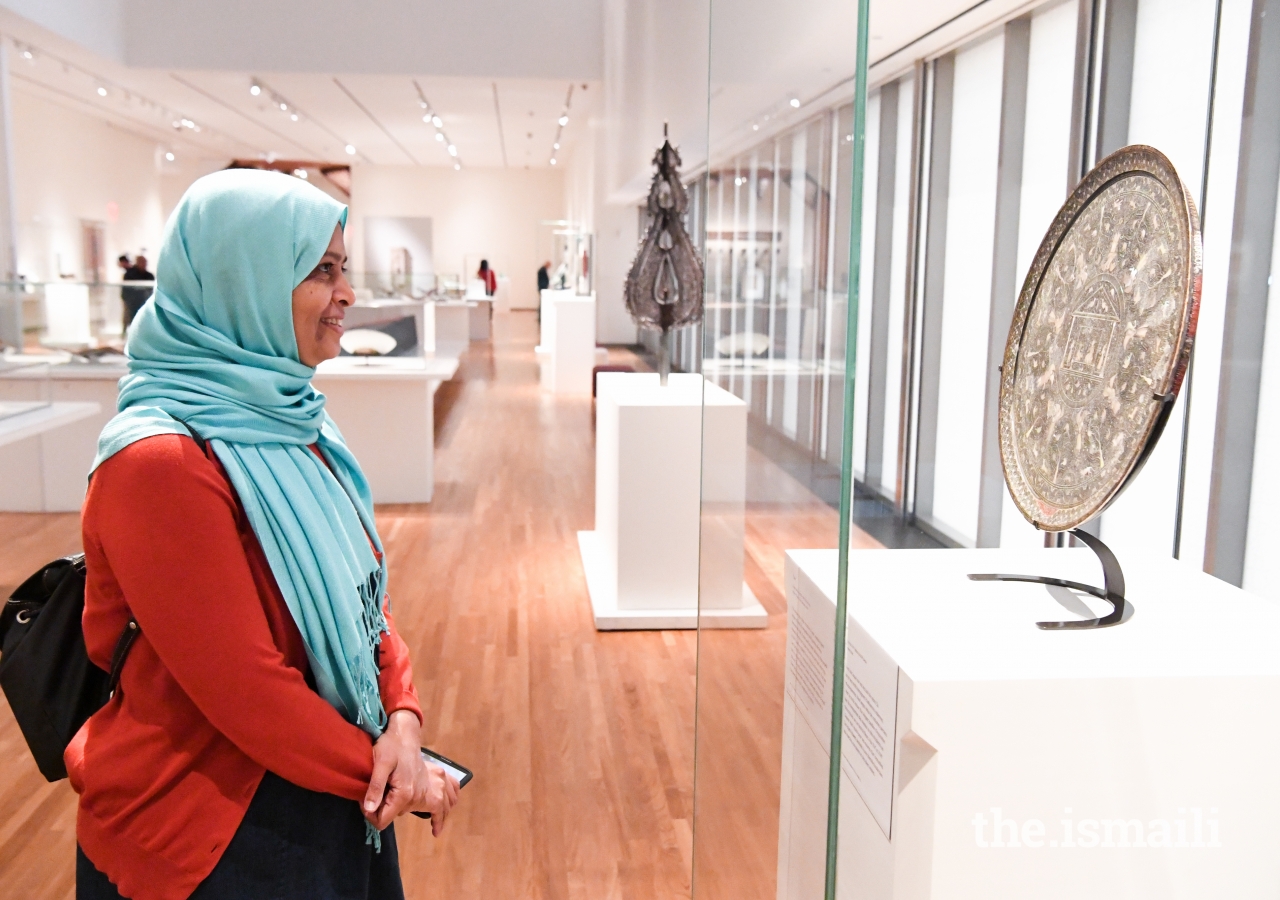 Dr. Sarah Sayeed admires the artifacts at the Museum.