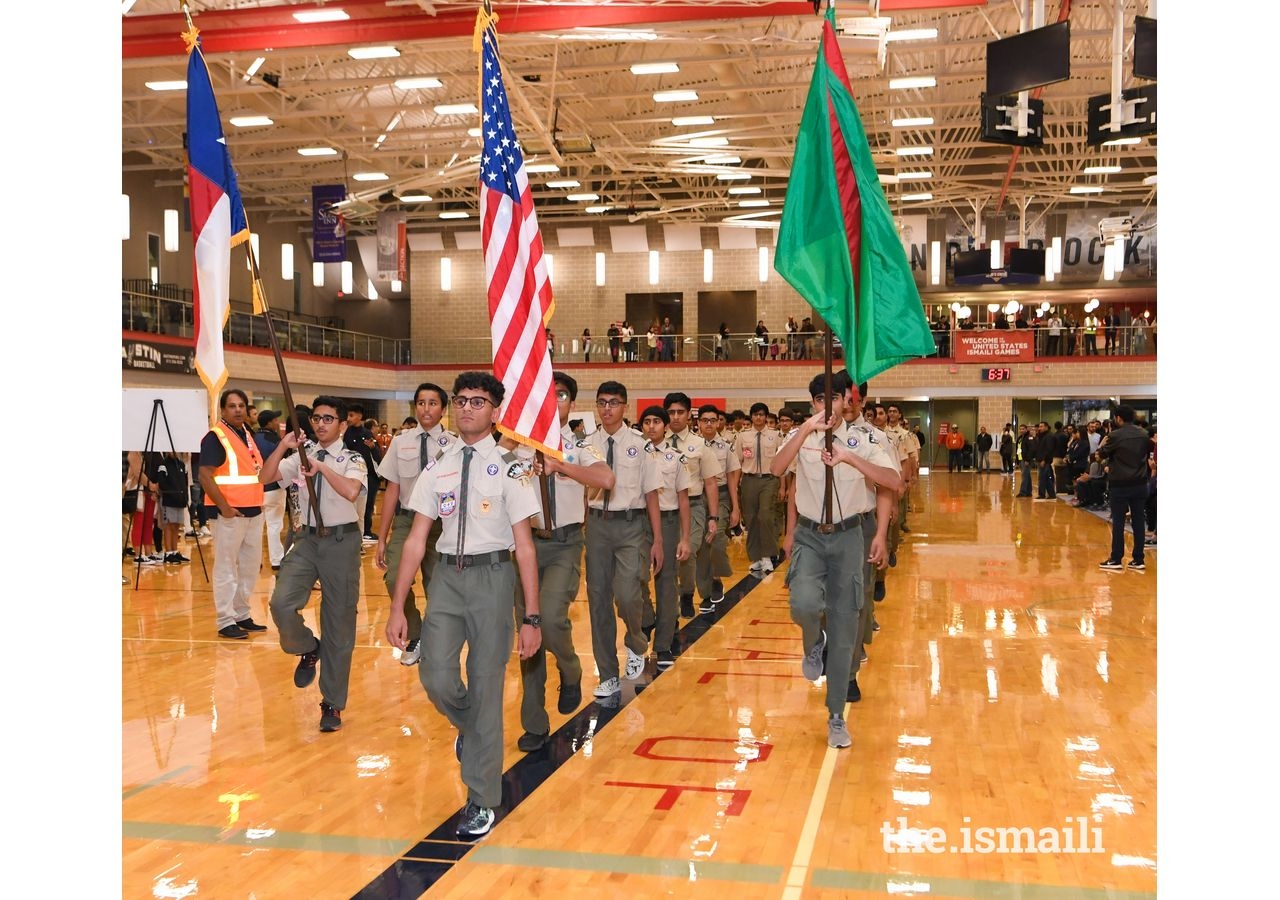 The Austin Boys Scouts lead the flag ceremony and procession during the opening ceremony.