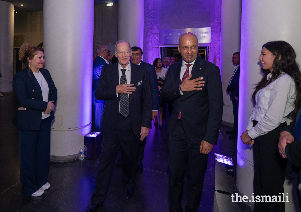 Prince Amyn and President Aiaze Mitha acknowledge members of the Ismaili Volunteers at the Aga Khan Master Musicians concert on 18 October 2023.