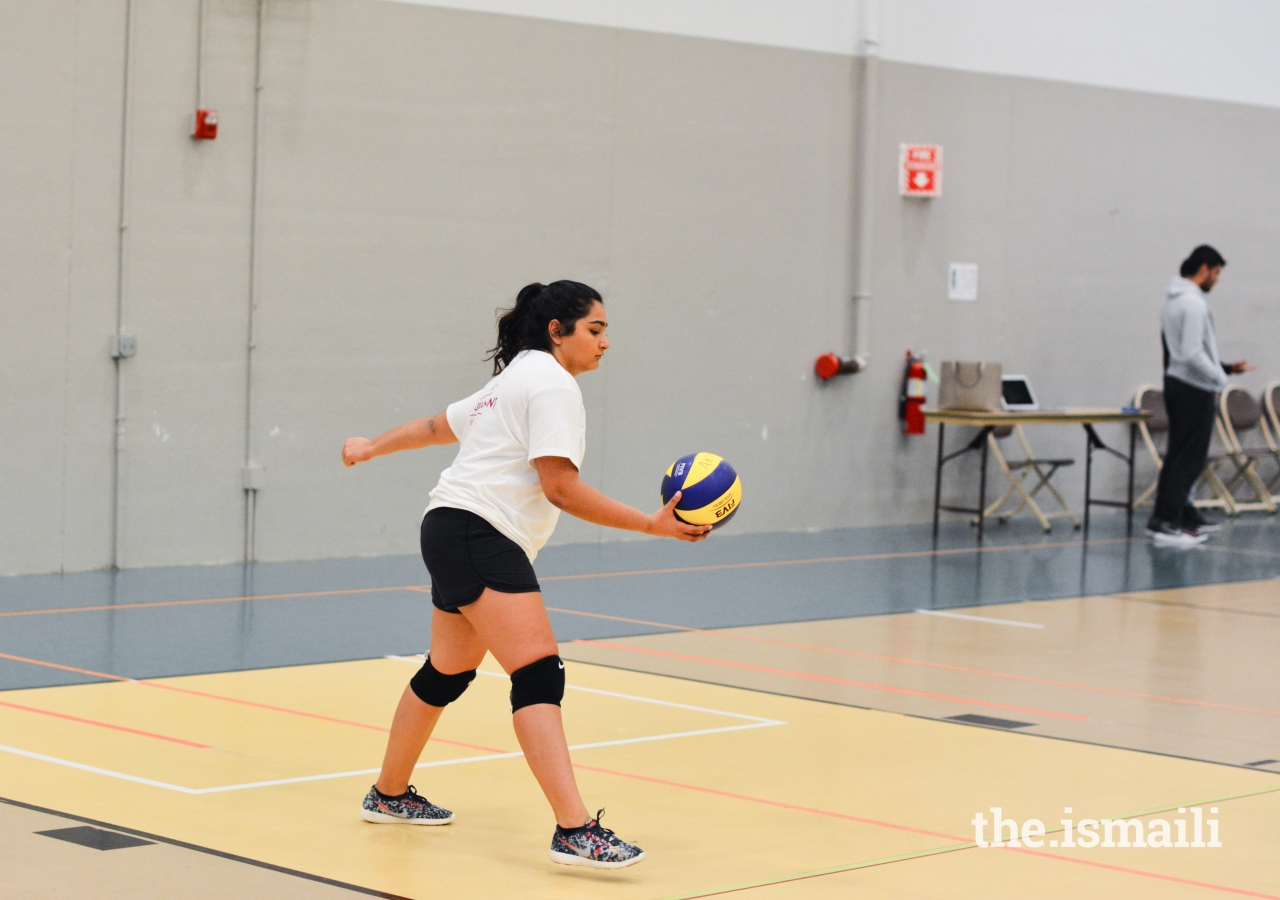 Sharifa Salauddin serving another successful serve in a competitive matchup. 