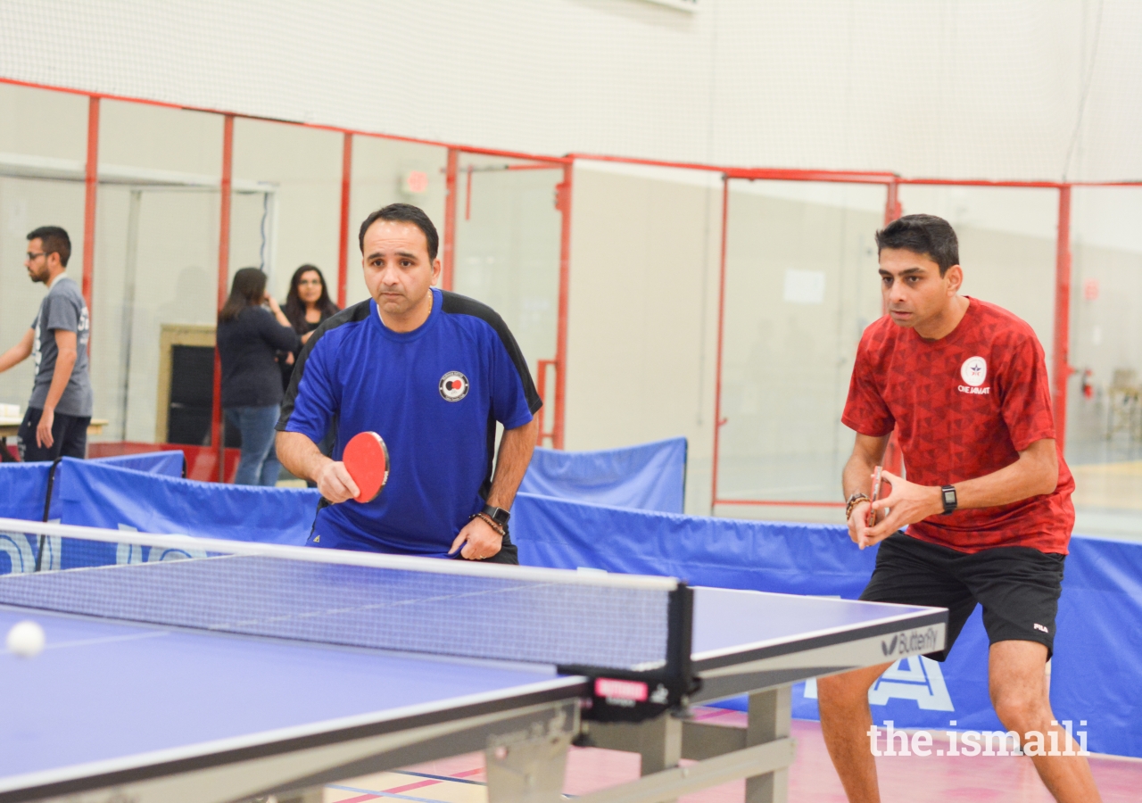 Nazim Nizar and Malik Hashwani concentrate on the fast serve from their opponents. 