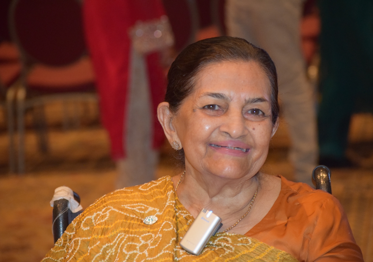 Khulsum Hussain Al-Virji smiling for the camera at the Diamond Jubilee in Orlando.