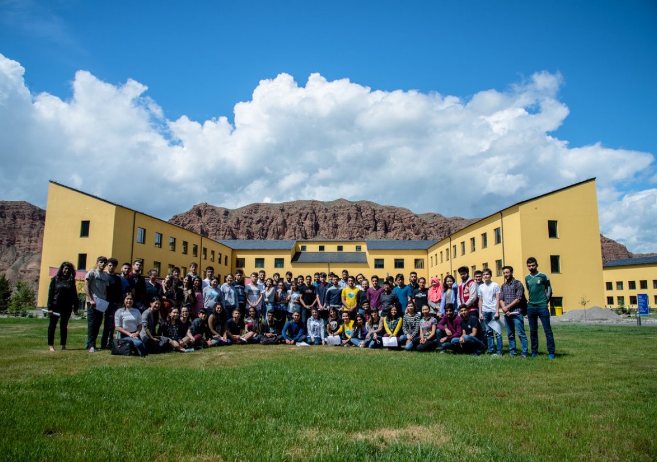 Alif with students at the University of Central Asia