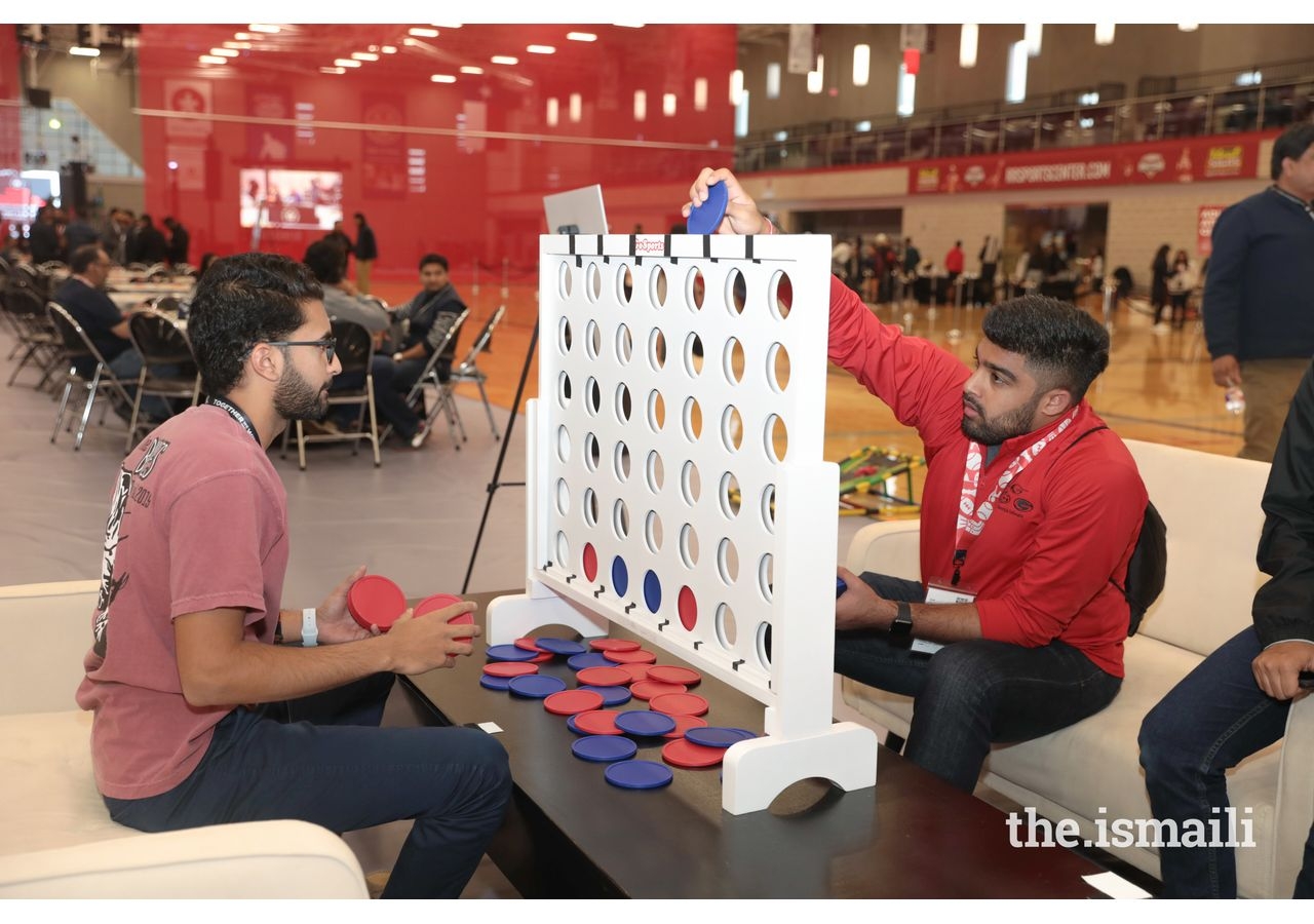 Athletes enjoy activities and games at the Athlete’s Lounge.