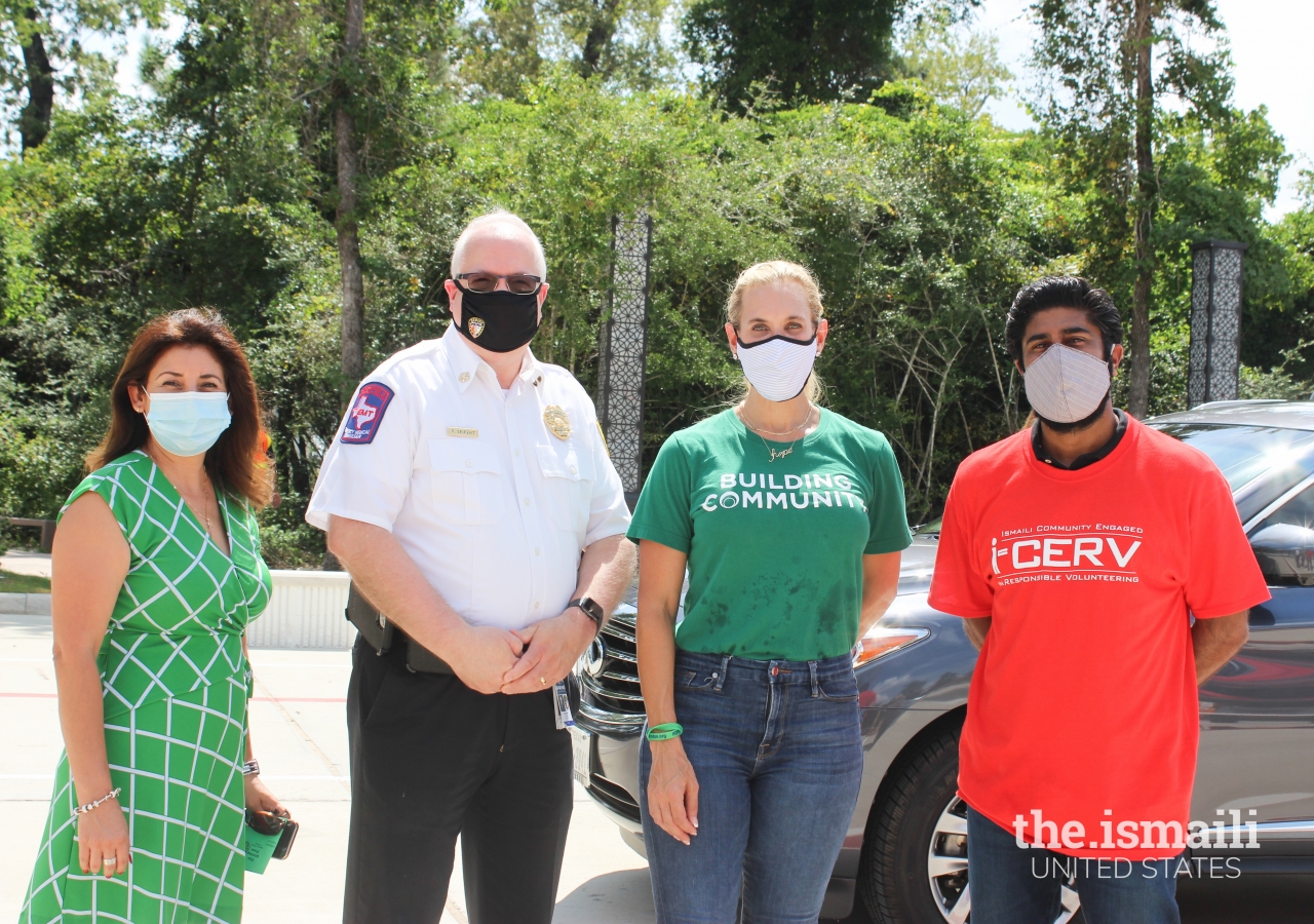 L to R: Edith Maldonado of WoodsEdge Community Church, Fire Chief Scott Seifert of the Spring Fire Department, President and CEO Missy Herndon of Interfaith of The Woodlands, and Ismaili Council Communications Member Alim Adatia.