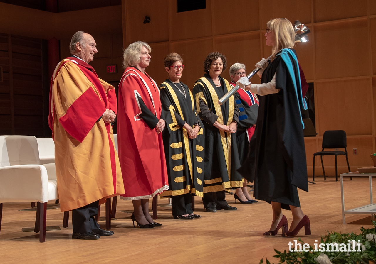 University of Calgary Registrar Angelique Saweczko yields the ceremonial mace at the honorary degree conferral ceremony at the University of Calgary.