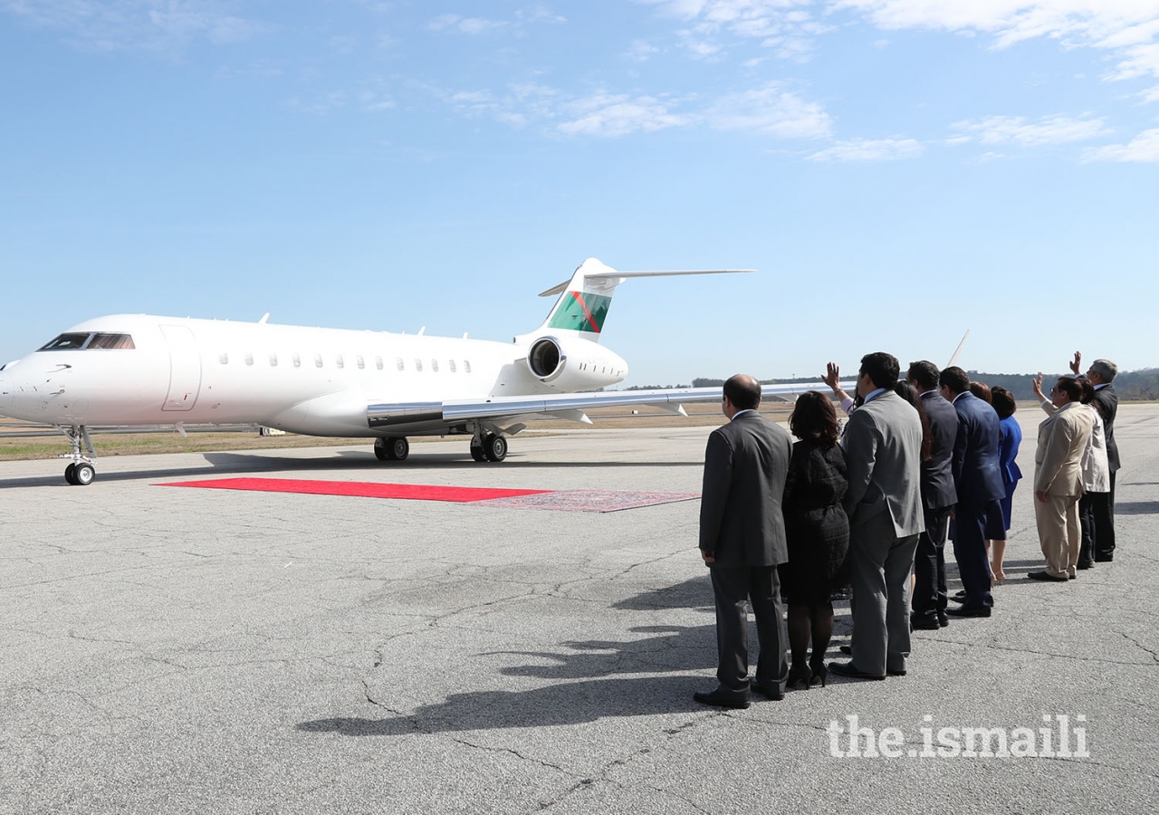 Jamati leaders wave goodbye to Mawlana Hazar Imam as he departs for Houston.