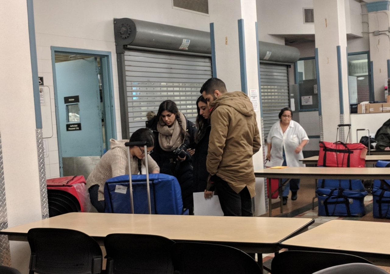 New York I-CERV members gather insulated bags with prepared food to be delivered as part of City Meals which provides warm meals to homebound individuals