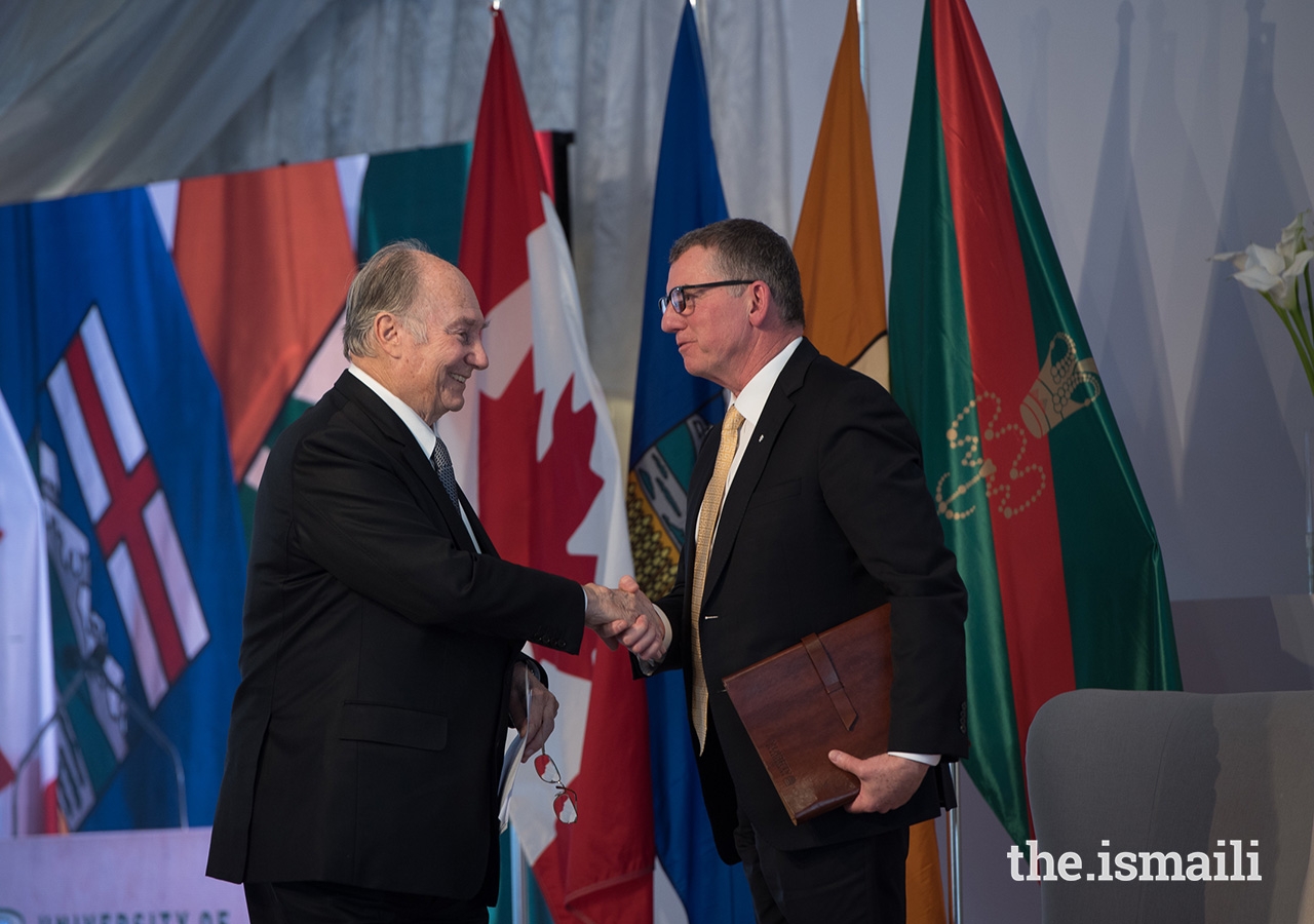 Mawlana Hazar Imam and University of Alberta President David Turpin shake hands after Hazar Imam delivers his remarks at the Aga Khan Garden inauguration ceremony.