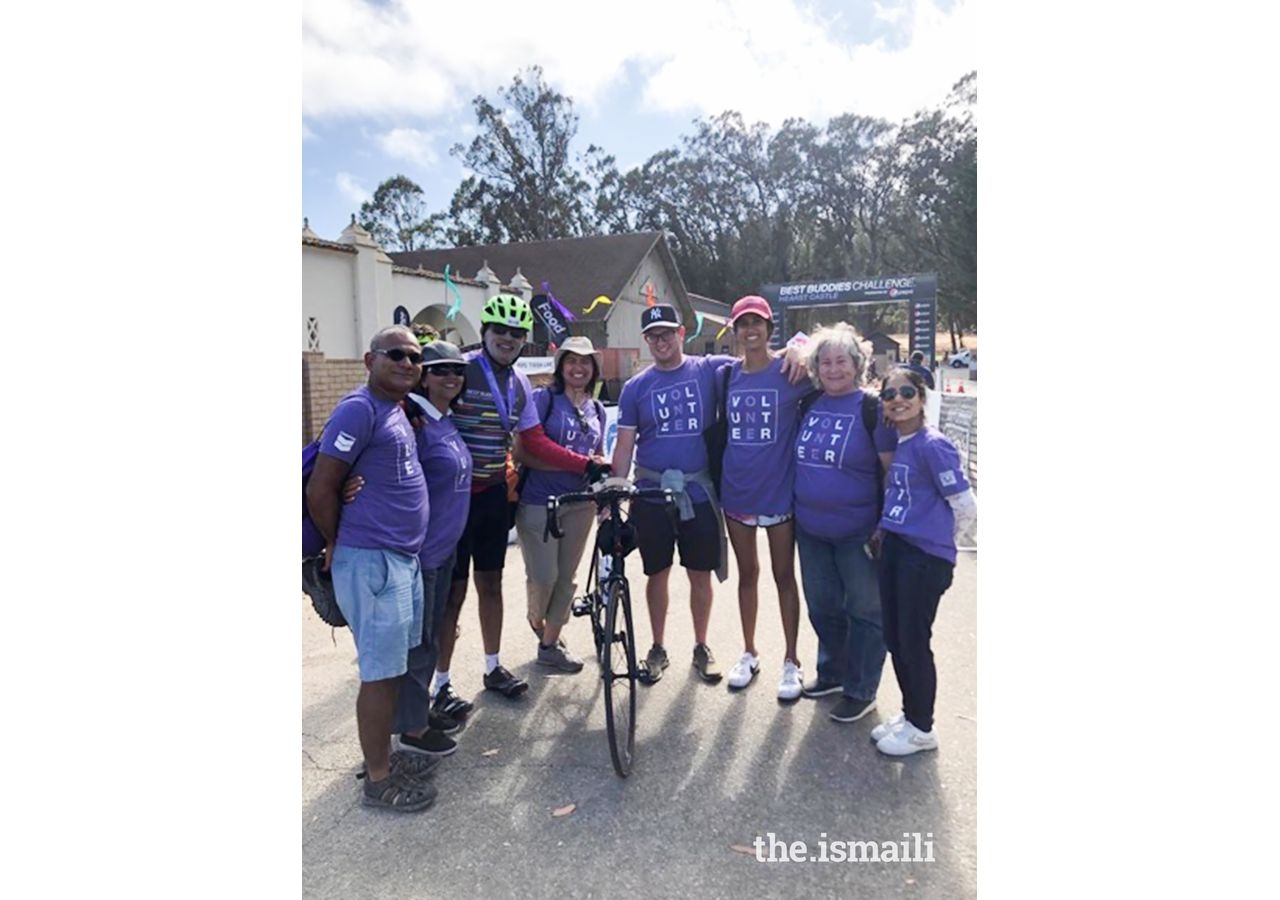 Volunteers and riders after the finish line.