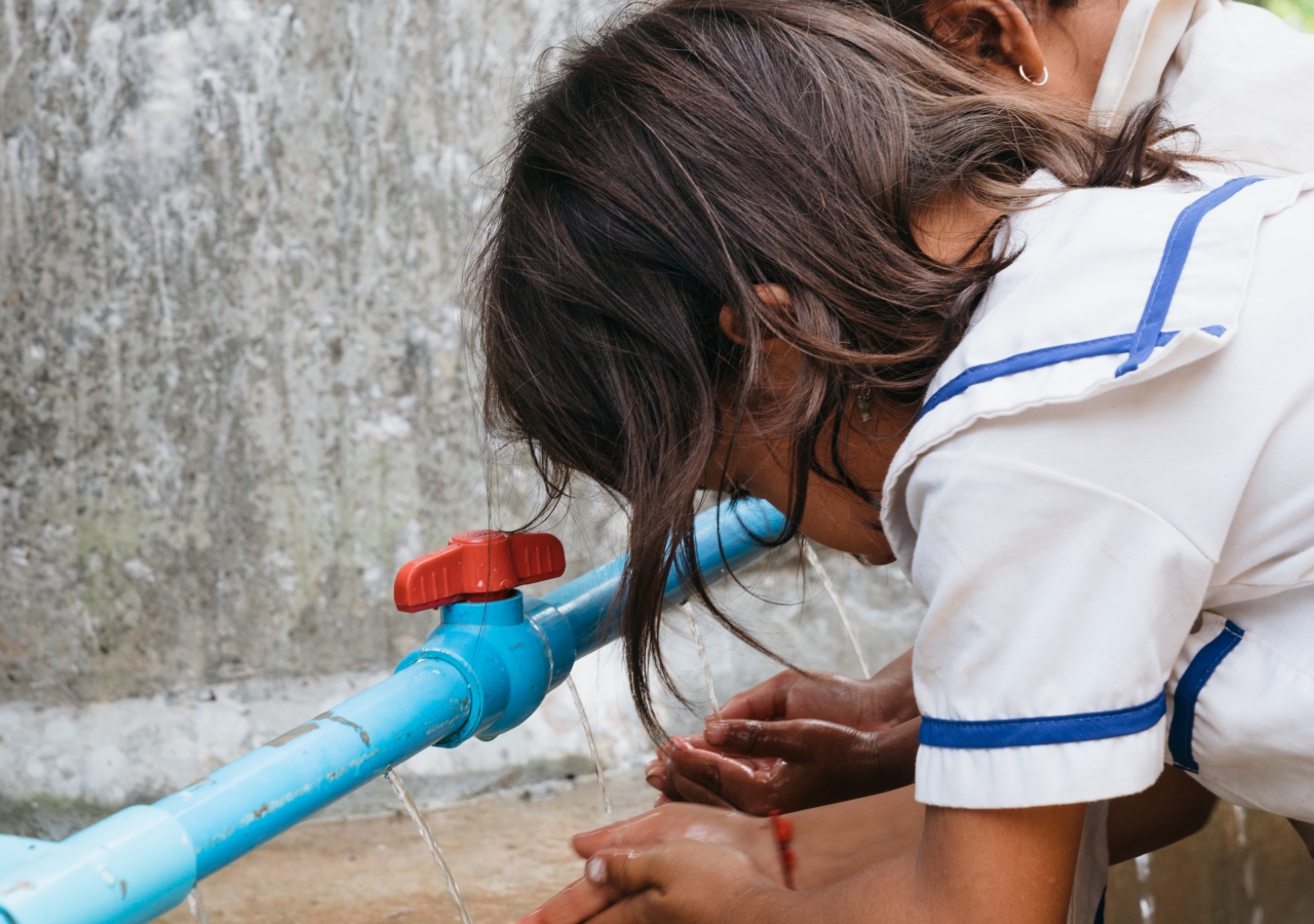 Students in Kralanh District, Cambodia learn to wash hands as instructed by their teachers