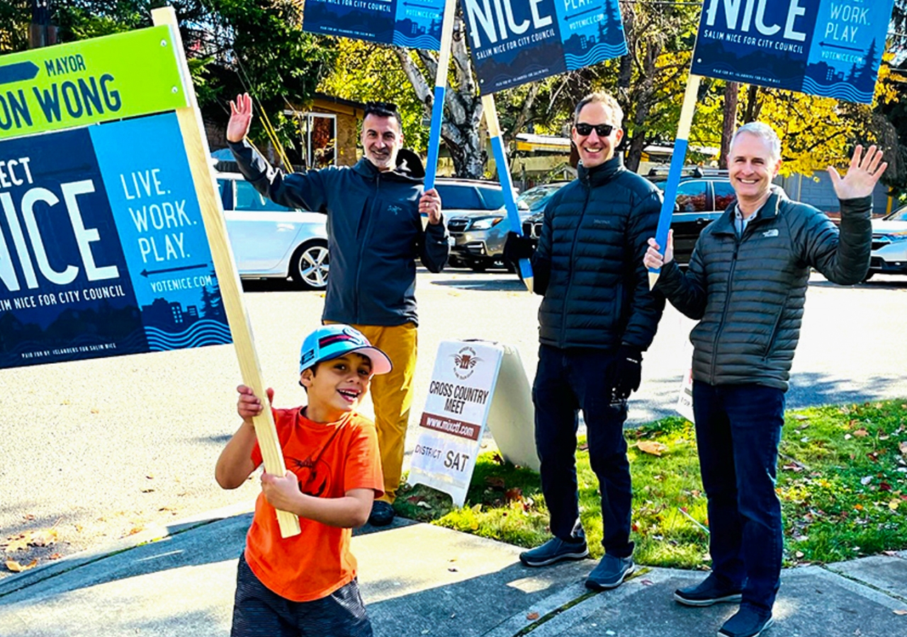 Salim Nice campaigning with his son for Mayor of Mercer Island.