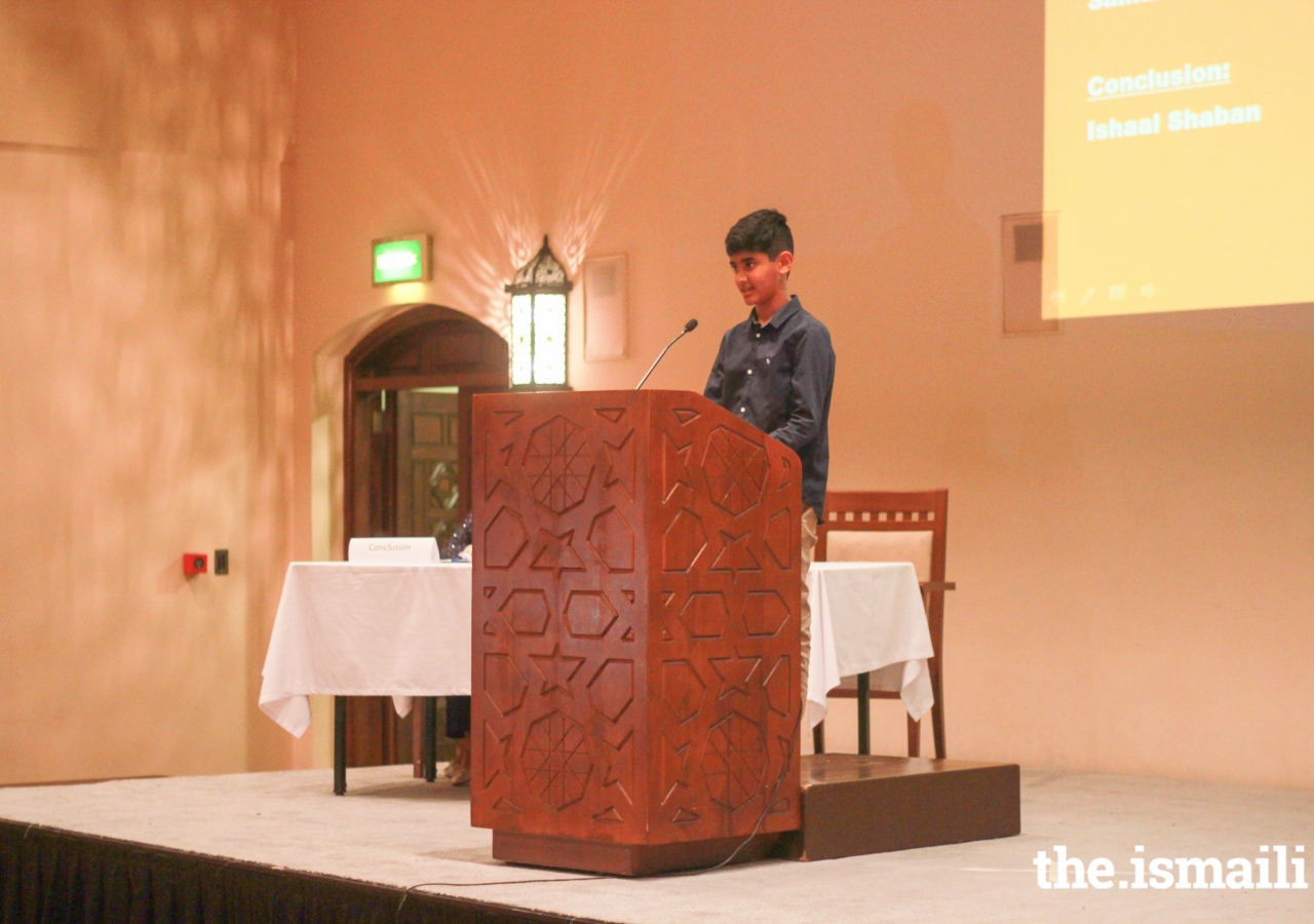 Afif Lakhani (11) presenting the affirmative team introduction for the motion - “Climate change is currently the greatest threat to Earth”.