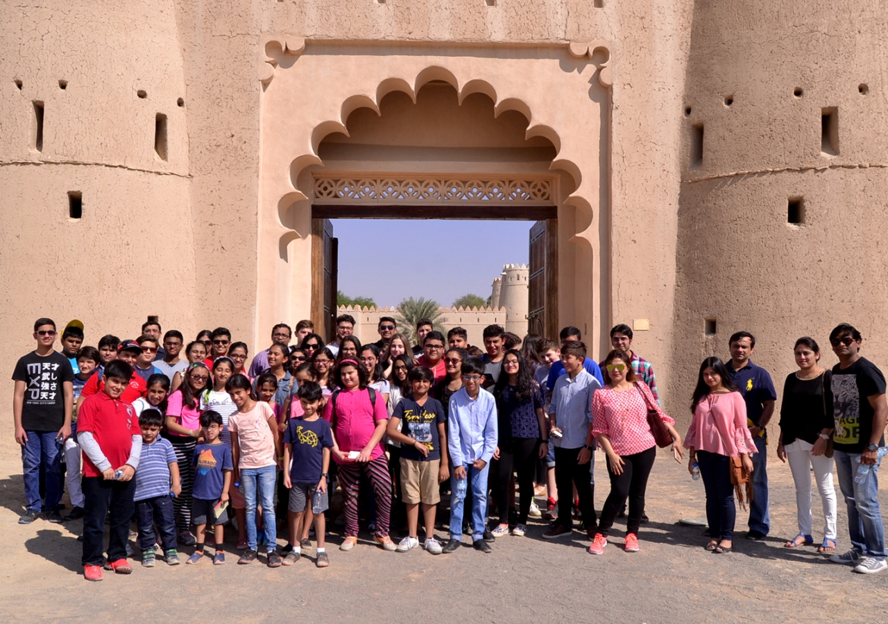 Students pose for a group photo in front of Al Jahili Fort, the venue of the 2016 Aga Khan Award for Architecture ceremony. Shuneal Shoukat Ali