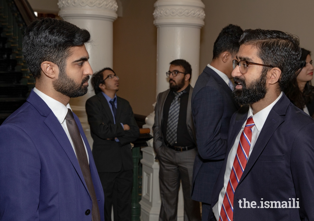 Students interacting and in conversation during the tour of the building and in between meeting with officials.