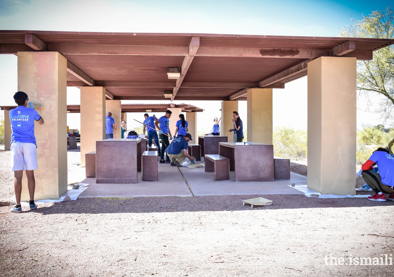 Volunteers will help to preserve the native desert habitat by trimming back overgrown trees and removing trash, by painting and sanding historic ramadas, Papago Park, Scottsdale, Arizona.