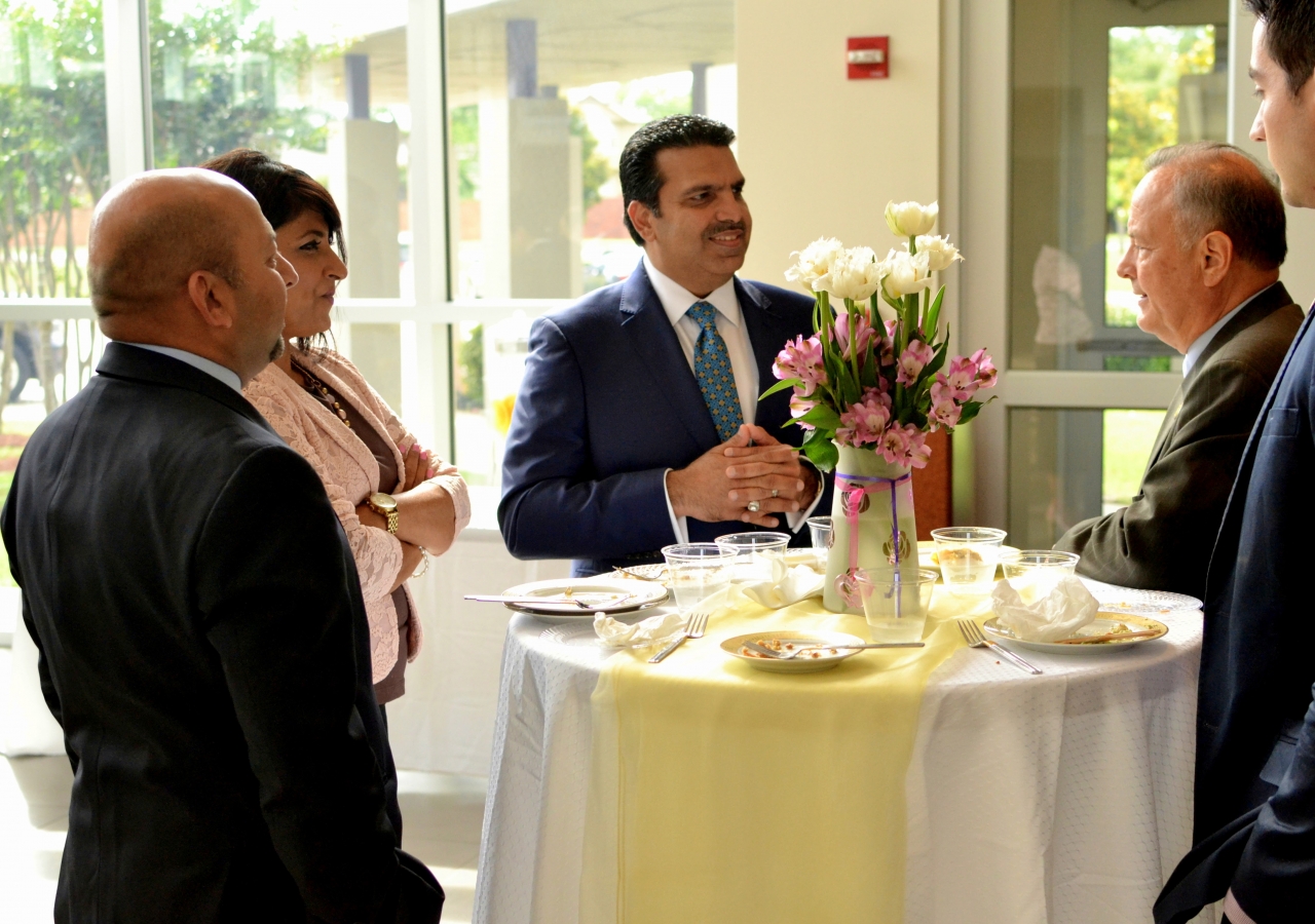 Former Texas Secretary of State Carlos Cascos, following a tour of the Ismaili Jamatkhana, Plano, with President Nizar Didarali of the Ismaili Council for Central USA, Samina Hooda, and Salim Rahimi.