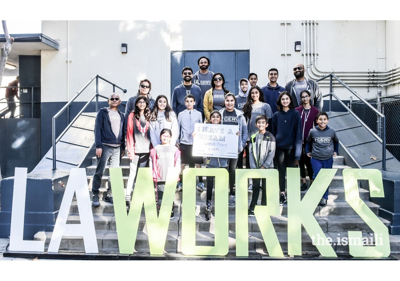 I-CERV volunteers pose with a special message for world peace.