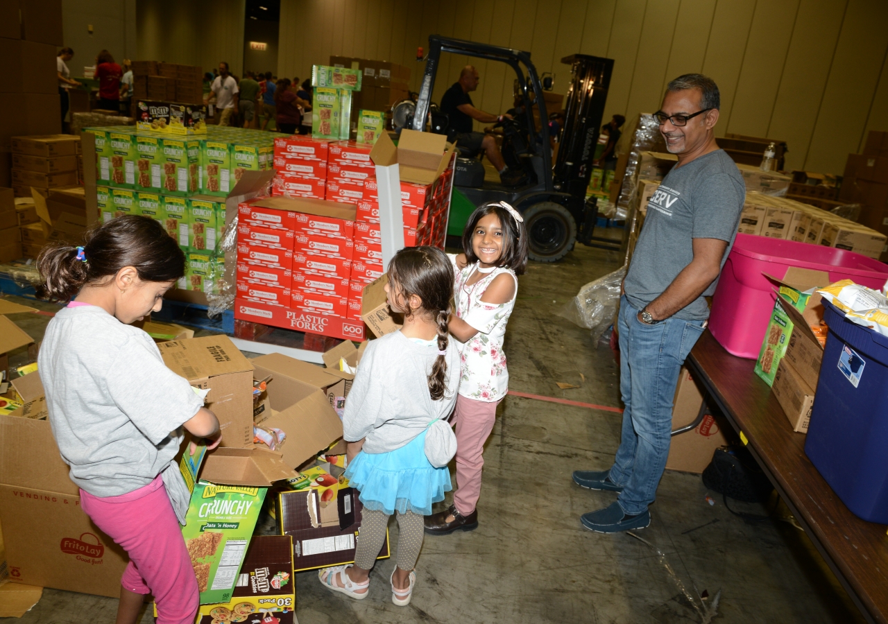 Sorting is an easy task when our little helpers are assisting their parents and other volunteers with such close attention to detail. 