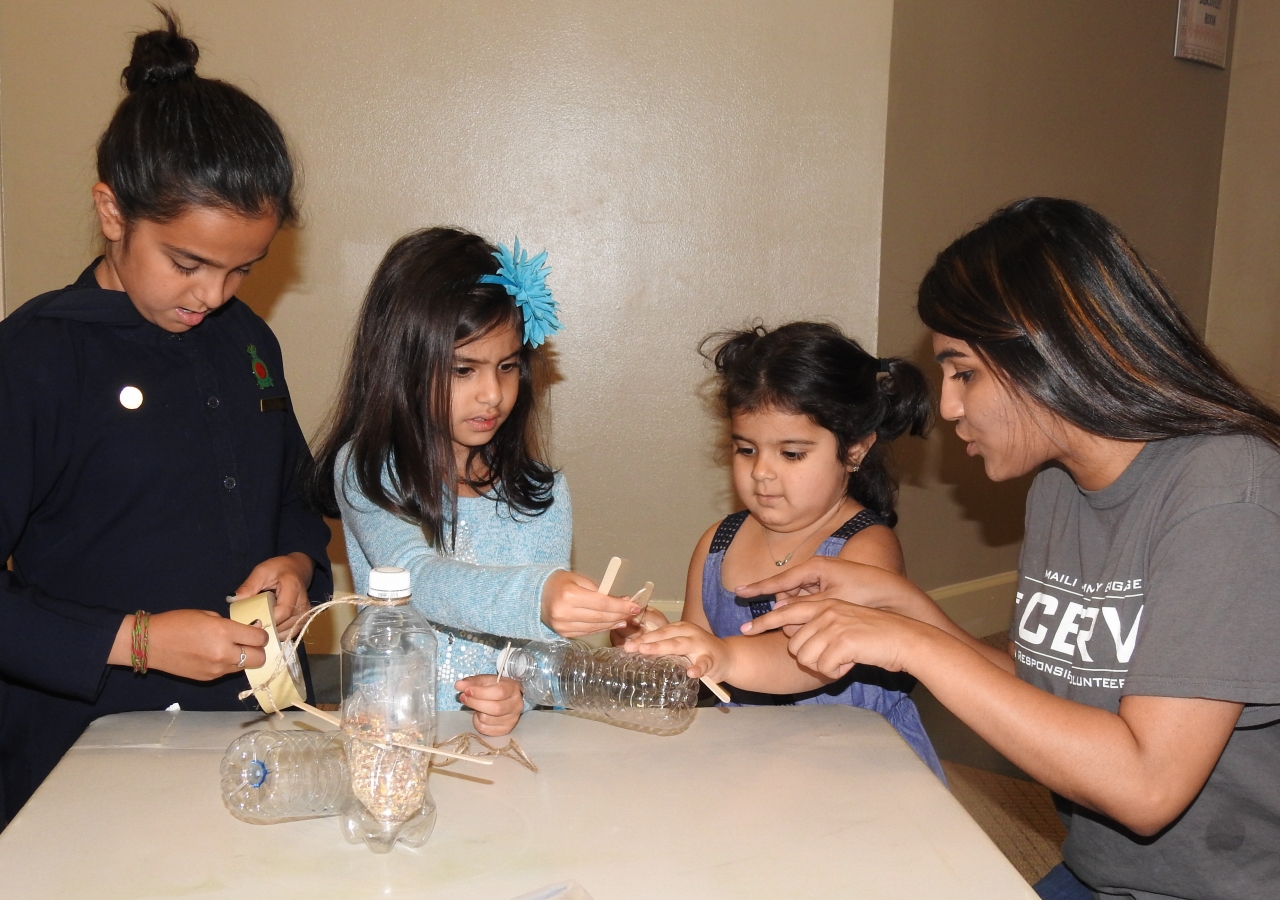 I-CERV youth making bird feeders for the Earth Day initiative in Atlanta.