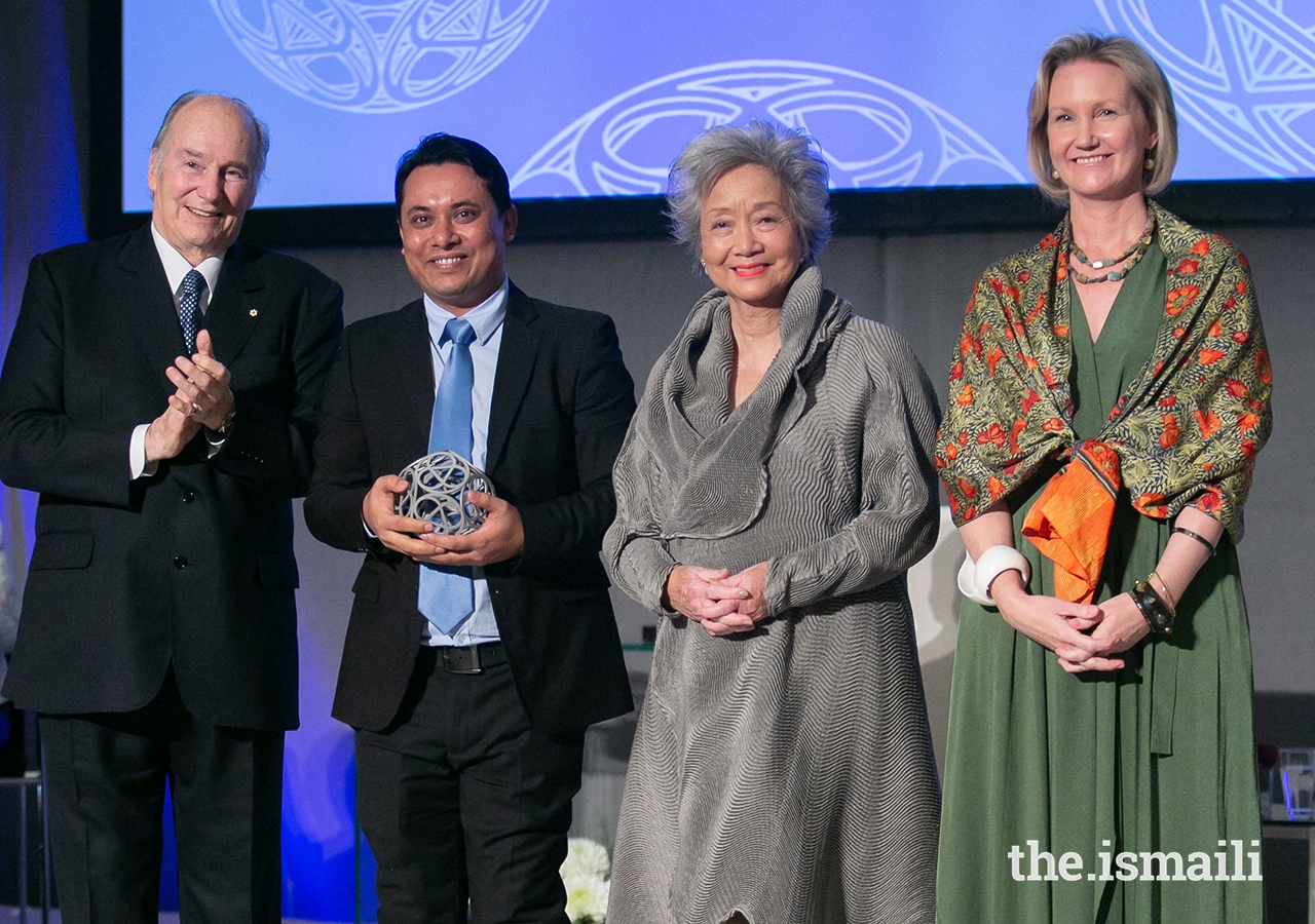 The Centre for Social Integrity founder Aung Kyaw Moe poses for a photo with Mawlana Hazar Imam, Global Centre for Pluralism Board Member The Right Honourable Adrienne Clarkson, and Global Centre for Pluralism Secretary General Meredith Preston McGhie.