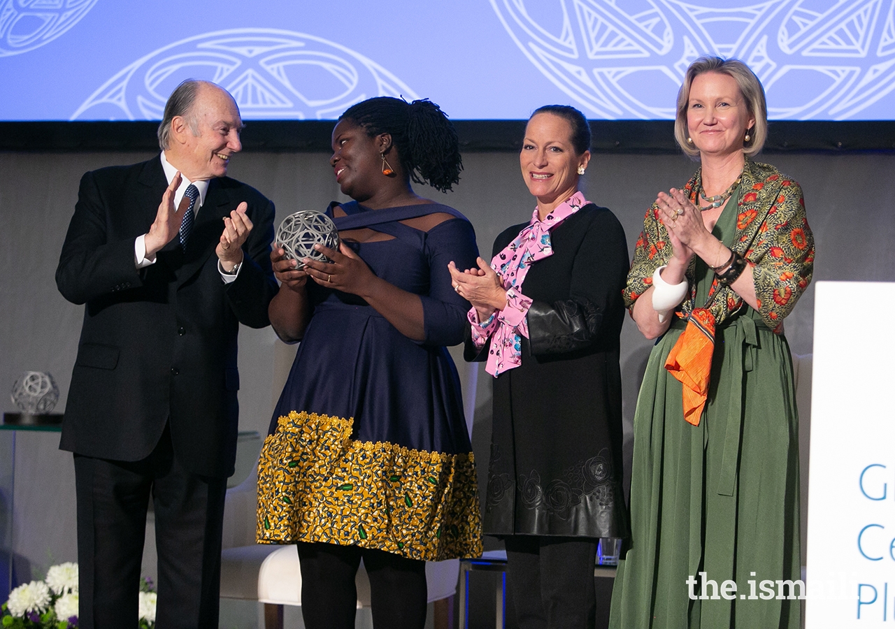 Deborah Ahenkorah, co-founder of Golden Baobab, poses for a photo with Mawlana Hazar Imam, Princess Zahra, and Global Centre for Pluralism Secretary General Meredith Preston McGhie.