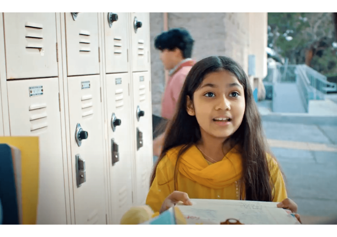  Shanessa Khawaja as Ameena, explaining her petition to  friends at school in the film.