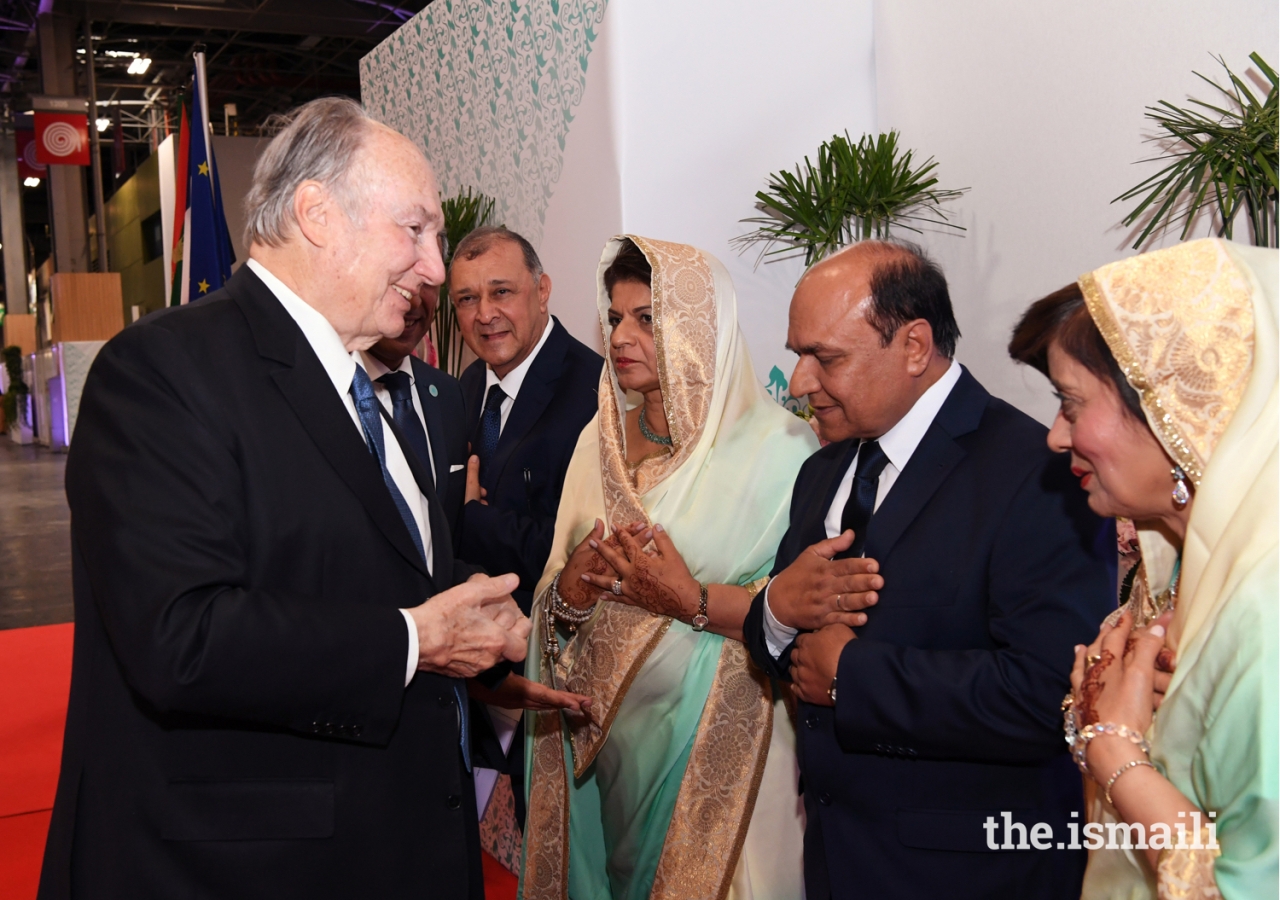 Mawlana Hazar Imam is received at the Darbar hall by Mukhi Saheb, Mukhiani Saheba, Kamadia Saheb, and Kamadiani Saheba of Paris Principle Jamatkhana.