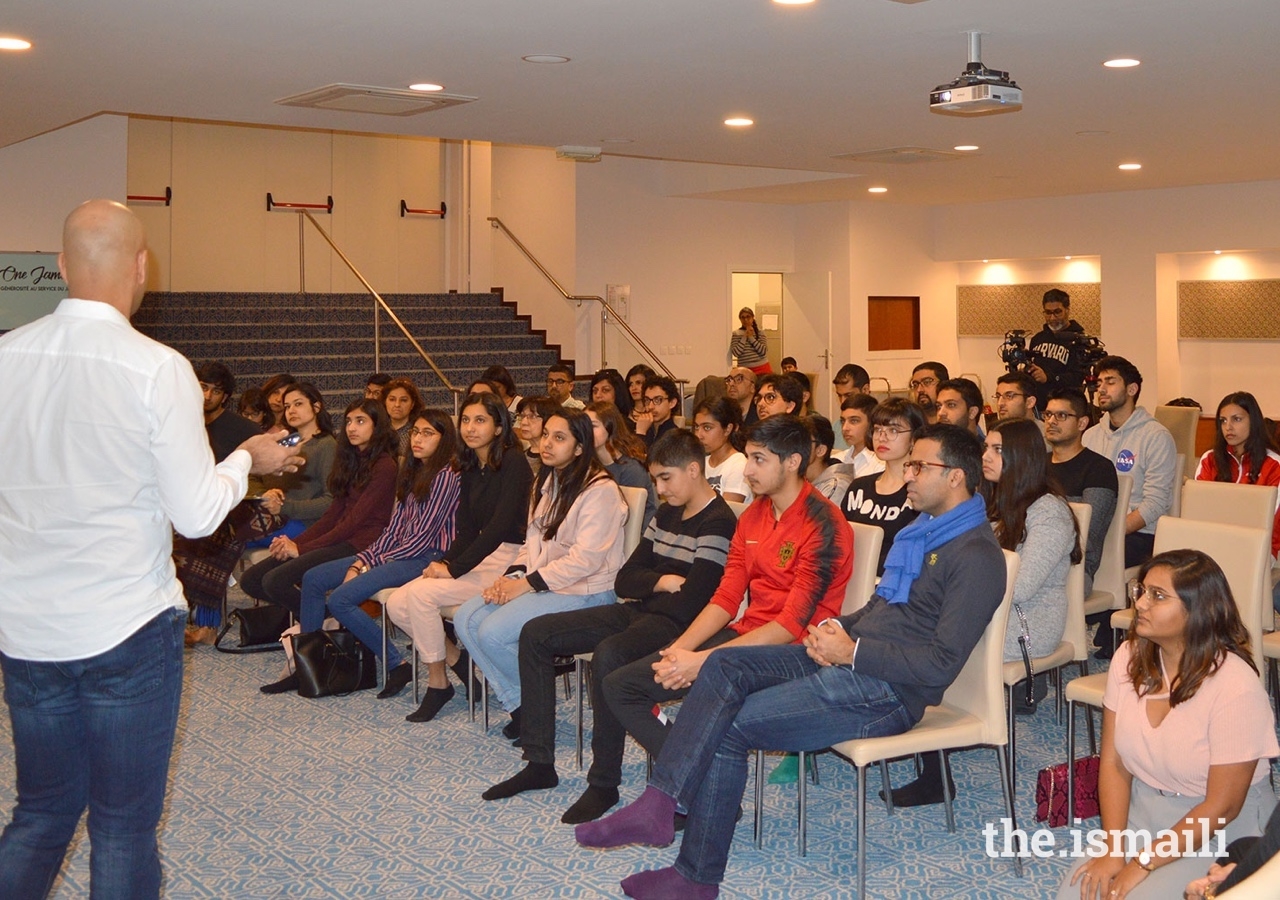 A keen audience intently listens to Ismaili technology experts at the Principal Jamatkhana in Paris.