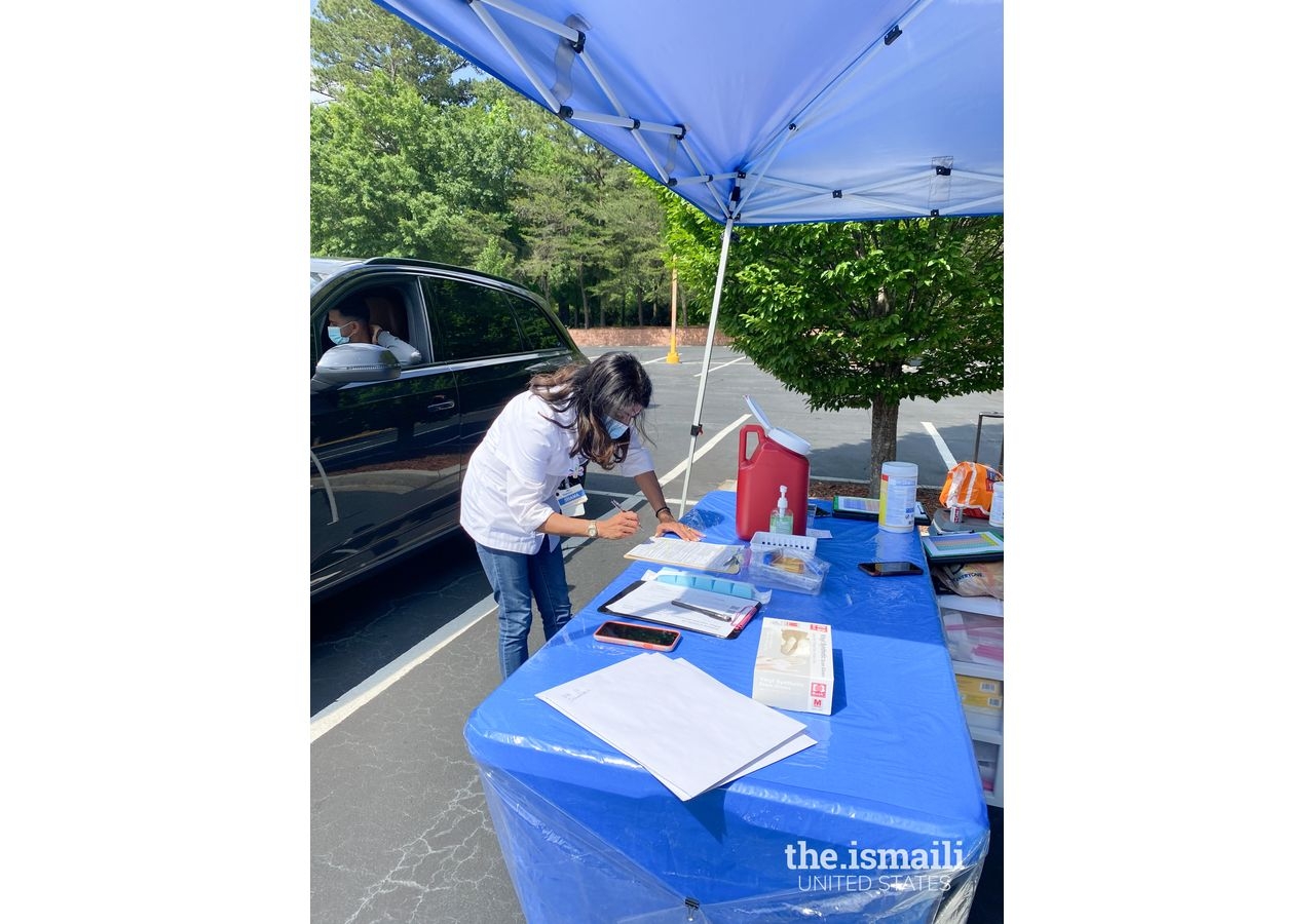 Shama Sarangi-Virani, a Pharmacy Clinical Services Manager at Walmart Pharmacy, helped secure the vaccine supply and administered vaccines at the COVID-19 vaccine drive at the Ismaili Jamatkhana in Atlanta.