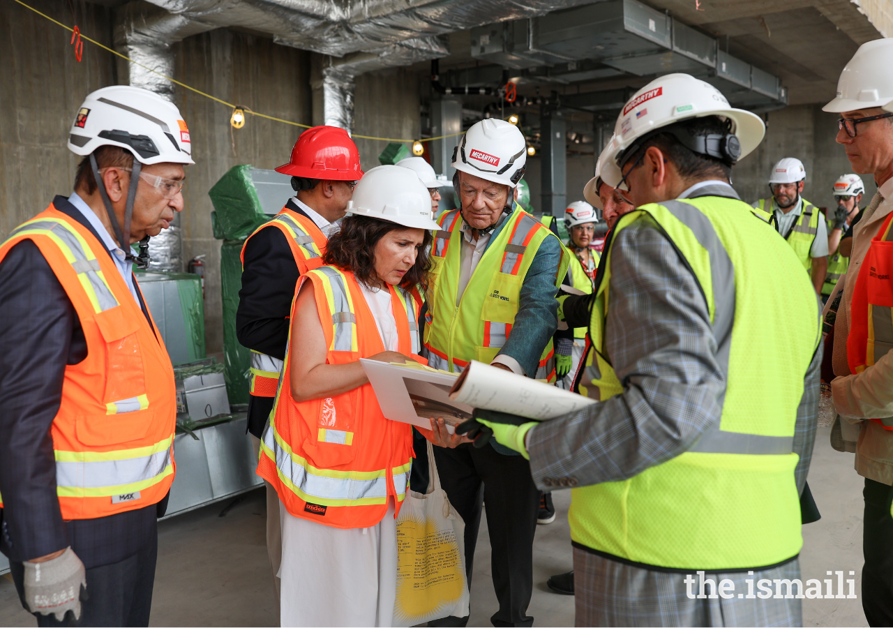 Lead design architect Farshid Moussavi presents architectural plans of the Ismaili Center Houston to Prince Amyn.