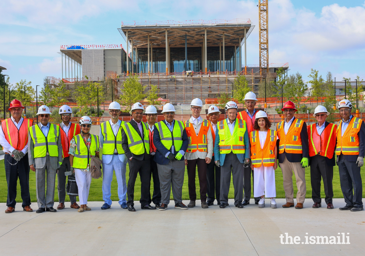 Prince Amyn joins the Oversight Committee of the Ismaili Center Houston for a group photograph.