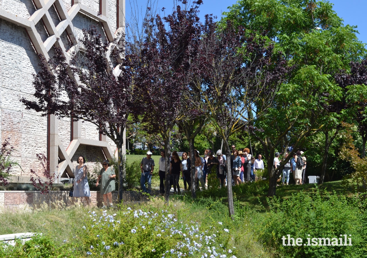 Visitors explore the great variety of plants, mostly Mediterranean, spread over the four main gardens that surround the Ismaili Centre in Lisbon.