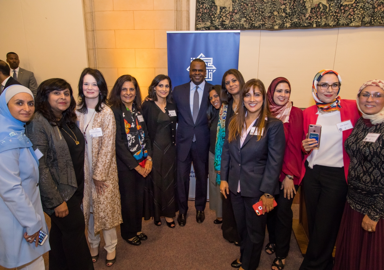 Mayor Kasim Reed poses with women attending Atlanta's first Iftar dinner in June 2017.