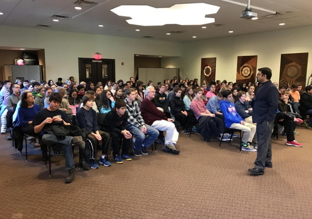 Murad Bhaidani leading a discussion on Islam with Springman Middle School students.