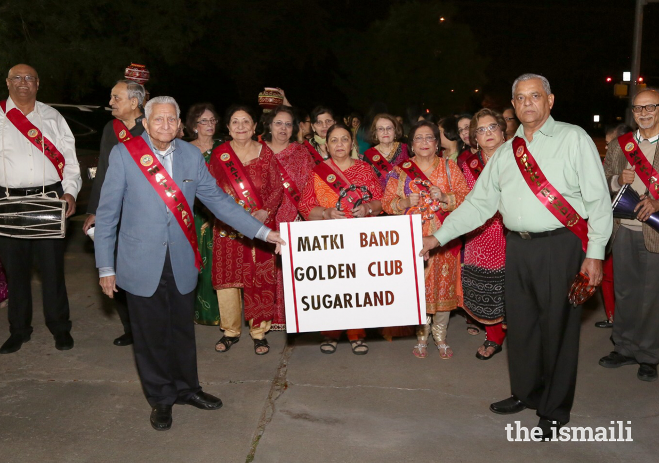 Ismaili Matki Band celebrating alongside other seniors during the Diamond Jubilee USA Mulaqat Celebrations at the Sugarland Jamatkhana, March 15, 2018.