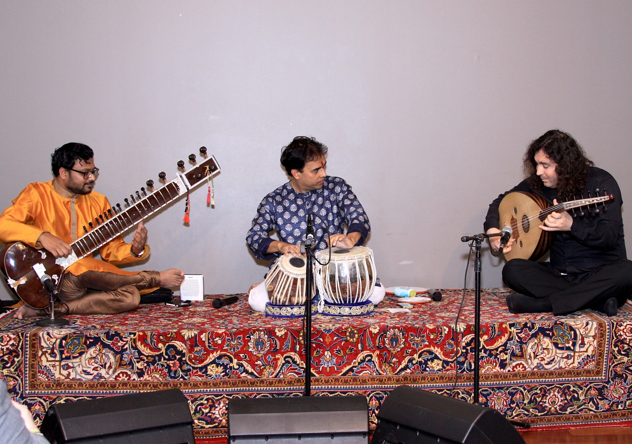 Sandeep Das jamming with Rajib Karmakar playing the sarangi and Kenan Adnawi, an oud virtuoso. In this collaboration, he brings together the intoxicating raga music of India with the magical maqam music of Arabia. 