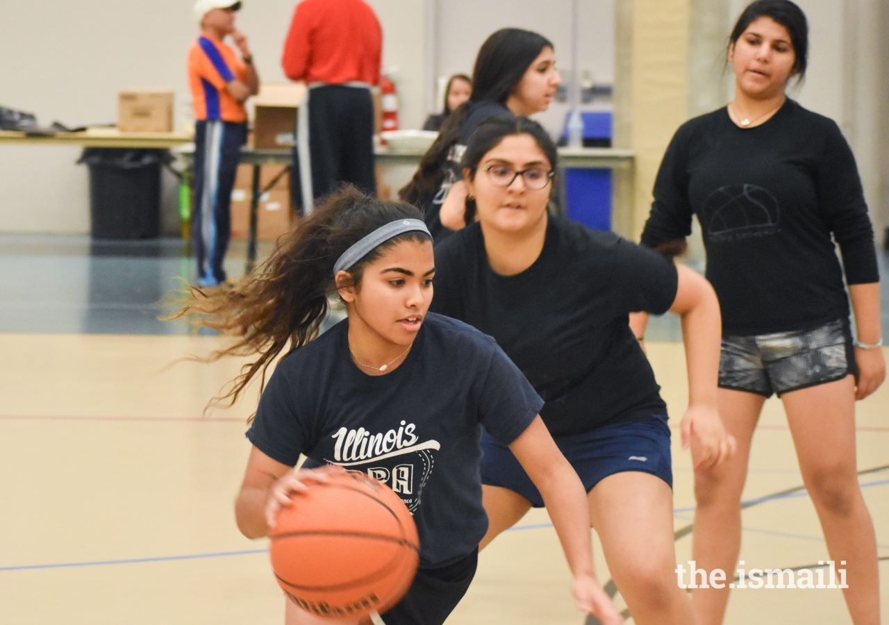 Saaniya Rupani tries to find an open shot, while battling a tough defense. 