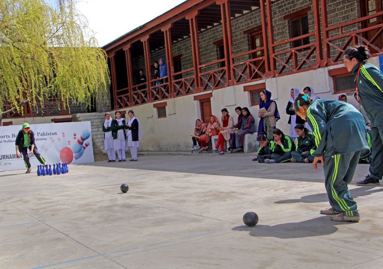 An athlete participates in the bowling tournament organised by the Aga Khan Youth and Sports Board for Pakistan.