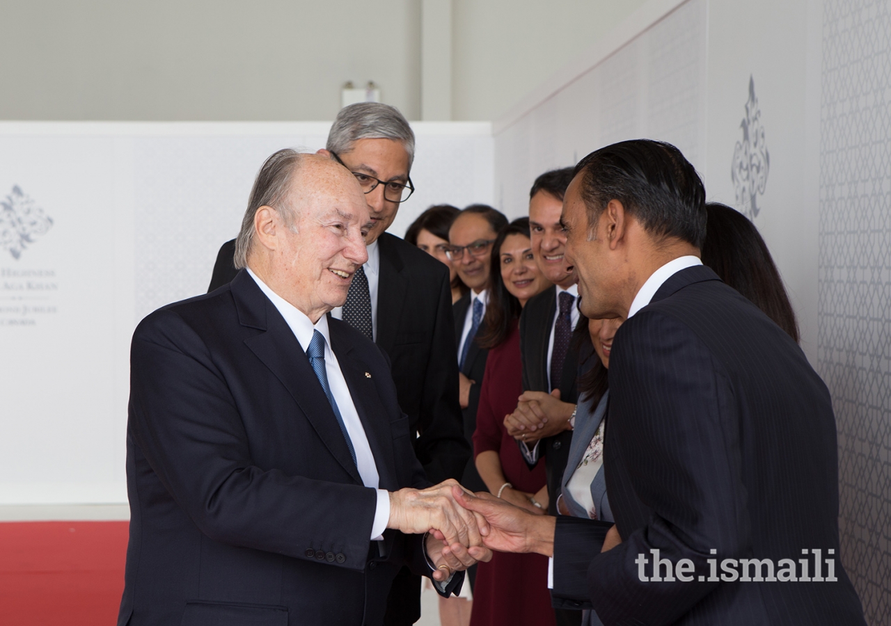 Mawlana Hazar Imam is greeted by Ismaili Council for British Columbia President Samir Manji upon his arrival in Vancouver for his Diamond Jubilee visit to Canada.