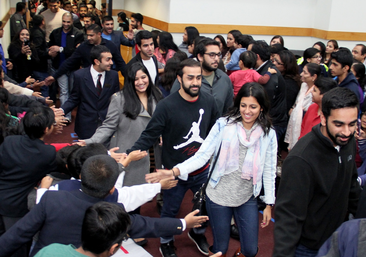 Athletes receive a hero's welcome from Ismaili youth at a pep rally held at Dallas Headquarters Jamatkhana ahead of USIG2015. Umair Ali