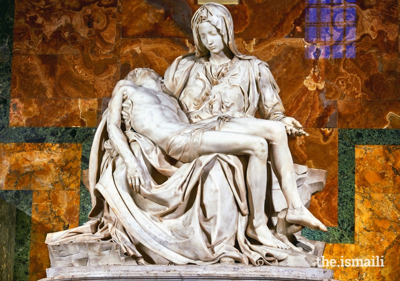 Michelangelo's Pieta, depicting Mary cradling Jesus, sculpted in 1499 and housed in St. Peter's Basilica, Vatican City.