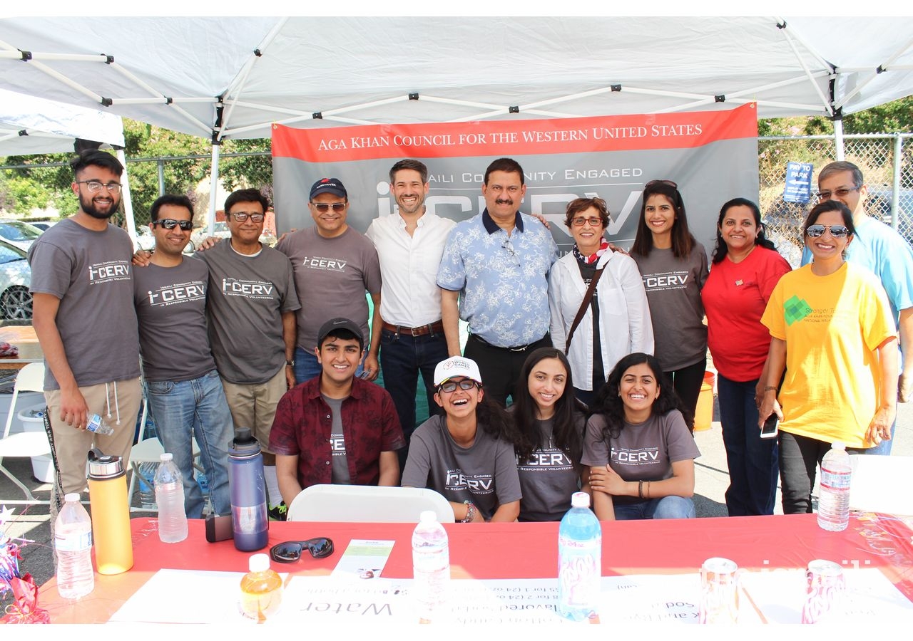 The northern California I-cerv team at San Jose’s 4th of July event take a picture with San Jose civic leaders, including candidate Matt Mahan.