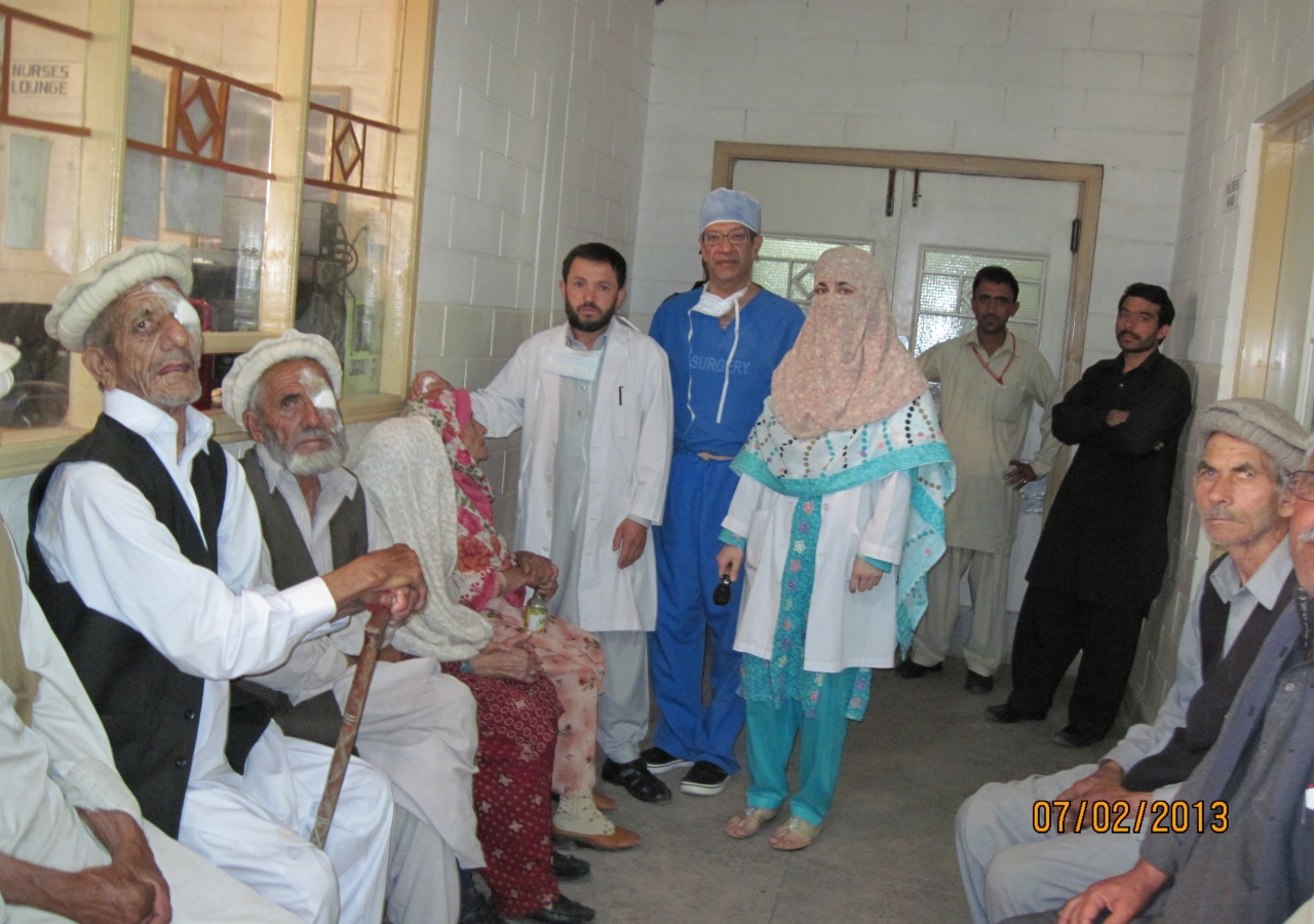 Dr. Kurwa (blue) in Chitral with patients and locals.  