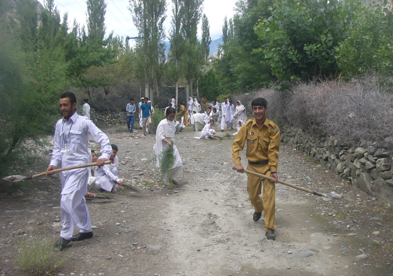 Scouts and Guides cleaning the roads in Gahkuch before the Diamond Jubilee