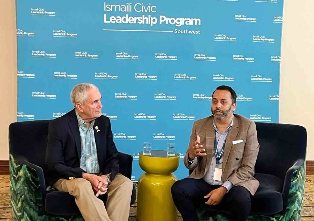 Sean Hassan, Elected Trustee and Vice-Chair of the Austin Community College Board and member for Community Building on the Ismaili Council for the USA, moderating a conversation with U.S. Congressman Lloyd Doggett.