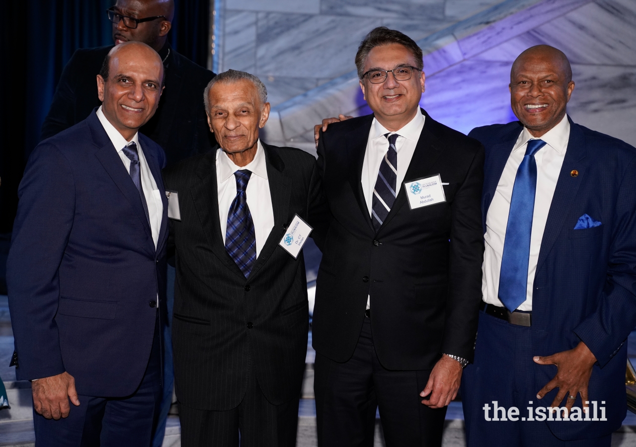 Vice President Zahir Ladhani, Dr. C.T. Vivian, President Murad Abdullah, and Don River pose for a picture at the Day of Religious Pluralism held on the 51st death anniversary of Dr. Martin Luther King, Jr., to honor his legacy of building a Beloved Community.