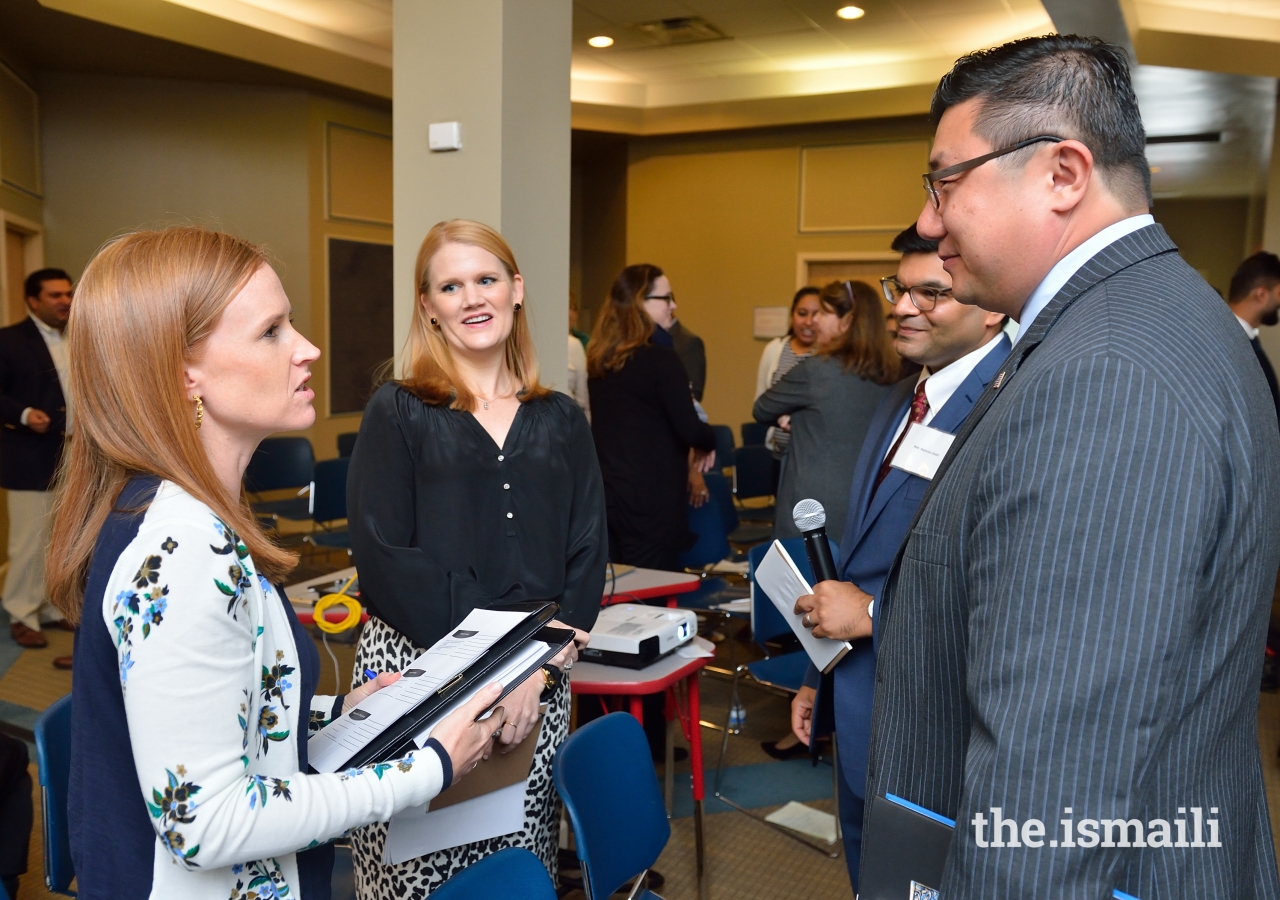 Participants engage in conversations and share best practices.